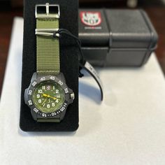 Men’s Tactical Watch Swiss Made New With Box Green Analog Watch For Everyday Use, Functional Automatic Watches For Outdoor, Functional Automatic Watch For Outdoor, Tactical Outdoor Watch With Analog Display, Tactical Outdoor Watch With 10atm Water Resistance, Black Green Color, Rolex Watch Box, Tactical Watch, Tank Watch