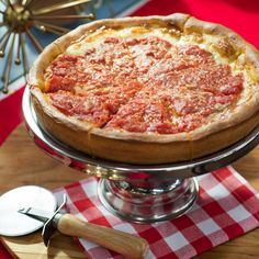 a pizza sitting on top of a metal platter