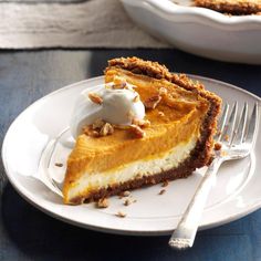 a slice of pumpkin pie with whipped cream on top