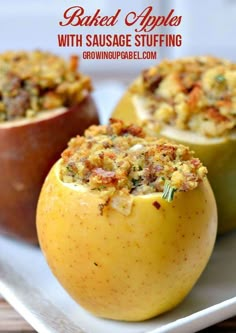 three baked apples on a plate with one stuffed in the middle and another filled with stuffing