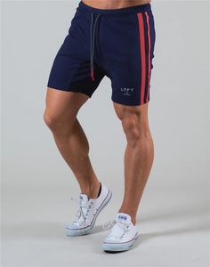 Side Stripe Men’s Fitness Short Navy Sportswear Shorts For Gym, Navy Athletic Shorts For Workout, Navy Sportswear Athletic Shorts For Workout, Sporty Navy Joggers For Gym, Navy Sporty Joggers For The Gym, Navy Sporty Athletic Shorts For Gym, Summer Stretch Sportswear Joggers, Summer Stretch Joggers Sportswear, Navy Sportswear Bottoms For Running