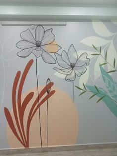 a wall with flowers painted on it