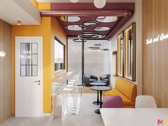 the interior of a modern office with yellow and purple walls, white tables and chairs