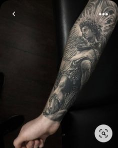 a person with a tattoo on their arm