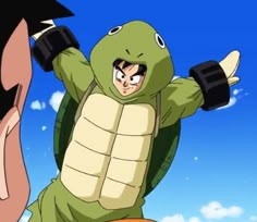 a man in a turtle suit holding onto another person's head