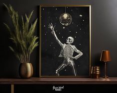 a skeleton is standing in front of a black and white photo with the moon above it