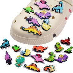 PRICES MAY VARY. 14 Pieces dinosaur shoes charms, for who love dinosaurs, these would be perfect choice for shoe decoration charms Safe premium quality PVC material, skin friendly, soft and durable Very easy to put them into your shoes holes or take them off DIY your own style: Most users love their croc shoes more after DIY their shoes with our faddish deco, ideal shoe charms for croc sandals Great gift choice, widely use not only for shoes but also for band bracelets or belts 14 Pieces dinosau Dinosaur Shoes, Croc Sandals, Croc Shoes, Shoes Charms, Band Bracelets, Shoe Decoration, Decorated Shoes, Band Bracelet, Your Shoes