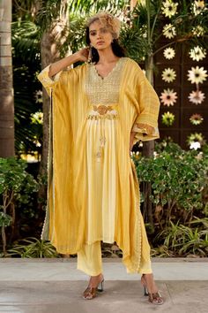 Yellow kaftan with thread, beads, nakshi and tassels embroidery. Comes with pant. - Aza Fashions Elegant Festive Palazzo Set With Tassels, Elegant Eid Sets With Tassels, Embellished Chanderi Kurta With Traditional Drape, Embellished Traditional Straight Kurta Set, Traditional Embellished Straight Kurta Set, Traditional Embellished Kurta For Navratri, Traditional Floor-length Kaftan For Diwali, Traditional Embellished Palazzo Set For Eid, Traditional Semi-stitched Floor-length Kaftan