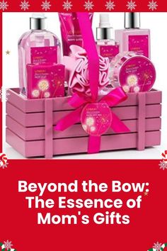 a pink gift box filled with personal care items and the words, beyond the bow the essence of mom's gifts