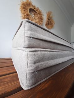 a stuffed animal sitting on top of a bed