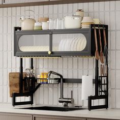 a kitchen shelf with utensils hanging from it's sides and dishes on the shelves