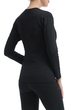 Stretchy, lightweight fabric will keep you comfortable throughout every stage of pregnancy while staying active in this long-sleeve top. Gathered sides flatter your growing baby bump and a surplice V-neck will make nursing discreet and easy once your little one arrives. 25" length Surplice V-neck Long sleeves 88% nylon, 12% spandex Machine wash, tumble dry Imported Black Long Sleeve Tops With Thumbholes, Long Sleeve Go-dry Tops For Yoga, High Stretch Black Long Sleeve Top With Thumbholes, Black High Stretch Long Sleeve Top With Thumbholes, Black Long Sleeve Top With Thumbholes For Layering, Versatile Black Tops With Thumbholes, Black Long Sleeve Top With Thumbholes, Versatile Long Sleeve Moisture-wicking Top, Black Go-dry Tops For Fall