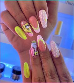 Step into the Easter vibe with these 21 fantastic nail designs! Whether it's adorable bunnies or vibrant eggs, we've got you covered to... Cartoon Inspired Nails, Nails Cartoon Design, Nickelodeon Nails, Cartoon Character Nail Art, Funky Nail Art Designs, Cartoon Nail Art Designs, Cute Nails Designs