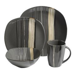 a black and white striped dinnerware set