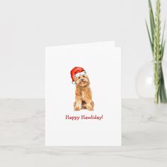 a card with a dog wearing a santa hat