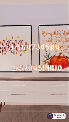 two pumpkins are on display in front of a white wall with the words fall and autumn