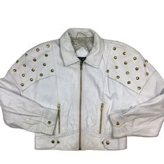 Vintage 80s/90s Creazioni Alta Moda white leather studded Moto jacket. Made in Italy. Fully lined. High-quality. Shoulder pads. Size tag is missing, measures as a women's small. 18 inches pit to pit, 20 inches long. Overall really good vintage condition, no rips or tears. Could use a light cleaning. Smoke and pet free home. Retro White Biker Jacket For Winter, White Fitted Punk Biker Jacket, Retro White Biker Jacket For Fall, White Punk Leather Jacket With Long Sleeves, White Long Sleeve Punk Leather Jacket, Retro White Leather Jacket With Long Sleeves, White Retro Leather Jacket With Long Sleeves, White Retro Long Sleeve Leather Jacket, White Leather Jacket