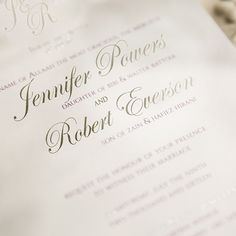 a close up of a wedding program on a table