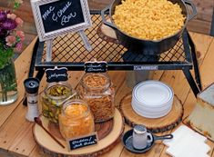 a wooden table topped with lots of food