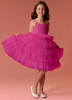 This knee length dress features a scoop neckline, bow tie straps, and a tulle tier skirt. Pink Dresses For Kids, Grad Photography, Fuchsia Flower, Magenta Dress, Tulle Flower Girl, Tier Skirt, Dream Bedroom, A Princess, Girl Dresses