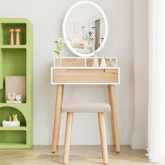 a small desk with a mirror and shelf in the corner, next to a green shelving unit