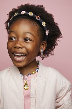 Snag your front row seat (or front yard porch chair!) and smile in style! This extra padded, black velvet headband is as comfy as it is stylish. Oversized floral gemstones in vibrant colors give a high-fashion pop to any outfit. Perfect for people-watching, trend-spotting, and catching the eye of allll the street-style photogs. #kidshair #kidshairaccessories #kidshairstyles Black Velvet Headband, Front Yard Porch, Porch Chairs, Outfit Comfortable, Yellow Gifts, Padded Headband, Velvet Headband