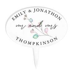 a wedding cake topper with the words, family and jonathon on it