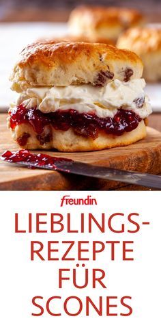 a close up of a sandwich on a cutting board with the words lieblings rezepte fur scones