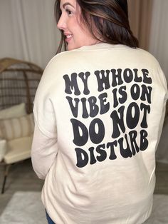 "Stay cozy and effortlessly stylish in our DND Graphic Sweatshirt. No need to explain your mood - let our sweatshirt do it for you with the bold statement, "My whole vibe is on DO NOT DISTURB." Comfort and attitude in one package. (Mic drop)" Graphic Sweatshirt Brand: Gilden Fit: TTS but size up if you want an oversized fit! S 2-4 M 6-8 L 12-14 XL 16-18 2X 18-20 3X 22-24 Model Stats: Heather 5'3" and is a size 12/14 in tops wearing the size XL for oversized. *** Our custom graphic tees are made Trendy Screen Print Sweatshirt For Loungewear, Inspirational Slogan Sweatshirt For Fall, Trendy Relaxed Fit Sweatshirt For Weekend, Trendy Text Print Sweatshirt For Loungewear, Weekend Relaxed Fit Sweatshirt With Letter Print, Relaxed Fit Graphic Print Sweatshirt For Weekend, Inspirational Graphic Print Sweatshirt For Fall, Trendy Slogan Sweatshirt For Loungewear, Weekend Letter Print Relaxed Fit Sweatshirt