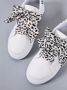 Chic and Stylish: Women's Leopard Lace-Up Front Skate Shoes - White Sn Trendy Flat Sneakers, Trendy Leopard Print Lace-up Sneakers, Trendy Summer Lace-up Shoes With Round Toe, White Flat Lace-up Shoes, White Lace-up Shoes For Summer, Casual Leopard Print Lace-up Sneakers, Trendy High-top Lace-up Shoes, Trendy White Sneakers For Spring, Chic Lace-up Sneakers For Summer