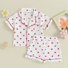 Fall in love with our HEARTS Muslin Pyjamas for baby girls! Featuring a playful hearts pattern, these pyjamas are perfect for Valentine's Day, or keeping cool and comfortable in the summer. Designed for your little sweetheart, these pyjamas are a must-have! Playful Printed Cotton Sleepwear, Cute Printed Cotton Sleepwear, Cotton Sleepover Sets For Summer, Cute Cotton Sleepwear With Cartoon Print, White Cotton Pajama Party Sets, Spring Cartoon Print Sets For Bedtime, Spring Bedtime Sets With Cartoon Print, Playful White Cotton Sleepwear, Summer Printed Sleep Sets