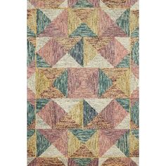 a multicolored area rug with an abstract design on the front and back side