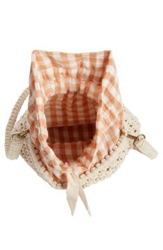 A gingham-print drawstring lining lends summery sweetness to this beach-ready bucket bag woven from chunky cotton yarns. Tie closure Removable strap Drawstring lining Textile Imported Cream Cotton Beach Bag For Vacation, Beach Cotton Shoulder Bag With Adjustable Strap, Casual Cotton Straw Bag For Travel, Spring Woven Shoulder Bag For Picnic, Woven Cotton Shoulder Bag For Spring, Spring Cotton Woven Shoulder Bag, Spring Woven Cotton Shoulder Bag, Spring Picnic Woven Shoulder Bag, Spring Natural Cotton Straw Bag