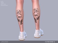 the legs are decorated with flowers and leaves, while one leg is covered in tattoos