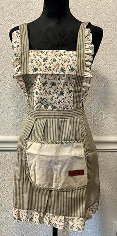 a mannequin with an apron on top of it