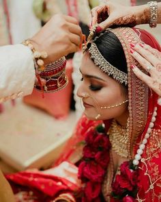 a bride getting ready for her wedding ceremony