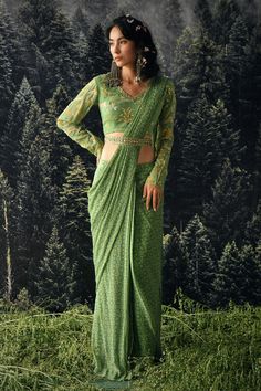 Green pre-draped saree with all-over bagh print print. Comes with embroidered blouse and belt.
Component: 3
Pattern: Print and Embroidery
Type Of Work: Bagh Print, Sequin and Cutdana
Neckline: V neck
Sleeve Type: Full
Fabric: Saree : Chiffon and Blouse : Georgette
Color: Green
Other Details: 
Embroidered scalloped border belt
Cutout at the back
Closure: Back hook
Occasion: Destination Wedding - Aza Fashions Paulmi And Harsh, Saree Chiffon, Bagh Print, Full Sleeve Blouse, Print Saree, Print Embroidery, Drape Saree, Indian Gowns Dresses, Indian Gowns