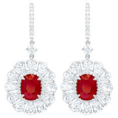 18kt white gold oval shape ruby GIA Certified earrings features: 6.69ct ruby, set in a halo with pear shape diamonds all around shaped like a flower with a total of 8.30cts of white diamonds. Diamond Halo Earrings, Ruby Set, Halo Diamond Earrings, Halo Earrings, Red Gemstones, White Gold Earrings, Diamond Flower, Pear Shaped Diamond, Diamond Halo