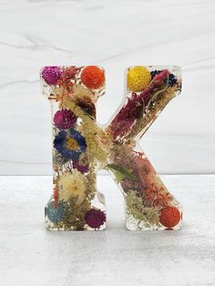 the letter k is made up of flowers