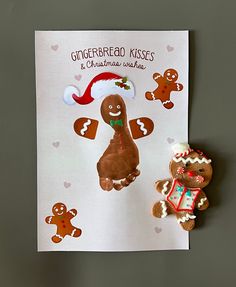 gingerbread kisses and christmas wishes are displayed on a piece of paper next to an ornament