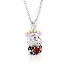 Calves bring joy and warmth to those who encounter them. Their adorable appearance, playful demeanor, and innate innocence make them a cherished part of the animal kingdom. Crafted in sterling silver, this necklace features a shimmering red heart-cut stone hugged by an adorable baby cow. This necklace is a wonderful gift for someone who love nature and the farming life! You will find more adorable and creative designs in our Hug Me® collection.Carat Weight: 1.4 ctStone Size: 6*6 mmStone Type: Je Playful Sterling Silver Jewelry For Birthday, Playful Silver Necklaces With Charms, Cute Sterling Silver Necklaces For Valentine's Day, Cute Sterling Silver Necklace For Birthday Gift, Playful Silver Necklace For Birthday, Silver Animal Design Jewelry For Gifts, Playful Silver Necklace For Gifts, Cute Sterling Silver Necklace With Heart Charm, Silver Jewelry With Animal Design For Gift