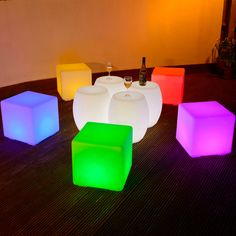 illuminated cube tables and stools on the floor