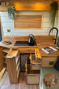 a kitchen with an oven and sink inside of it