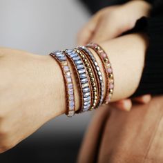 This exquisite wrap bracelet is crafted with luxurious labradorite, jasper, crystal, and pyrite stones and is sure to give your look a touch of bohemian chic. The stackable design creates a layered effect that adds texture and an eye-catching shimmer for a stunning, sophisticated accessory that will bring a hint of glamour to any ensemble. *Material: Jasper, labradorite, crystal, pyrite, leather *Making Technics: Handmade Sewed *Size: 32.5 inches, 3 closures adjust length to fit your wrist. *Pro Bohemian Metal Wrap Bracelet, Bohemian Wrap Bracelet With Natural Stones, Bohemian Turquoise Gemstone Beads Wrap Bracelet, Gold Bohemian Wrap Bracelet With Faceted Beads, Bohemian Brown Wrap Bracelet With Natural Stones, Gemstone Wrap Bracelet, Spiritual Jewelry, Bohemian Chic, Healing Stones