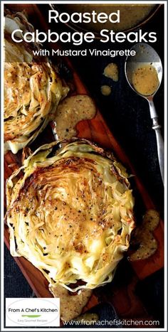 some food is sitting on a wooden board and next to a spoon with something in it