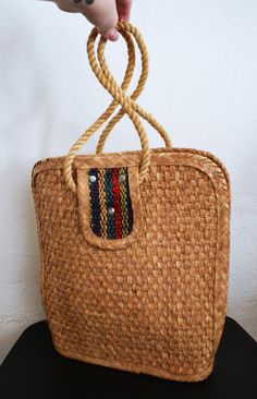 Woven Straw purse,boho bag,top handle bag Really cute tan, brown straw purse with colorful stripe design Purse has 2 outside pockets PLEASE SEE MEASUREMENTS Measures: 13'' x 12 1/2'' x 4'' Straps: 20'' with an 8'' drop Good condition- b196 Woven Straw purse,boho bag,top handle bag Brown Bohemian Straw Tote Bag, Brown Double Handle Beach Bag With Top Carry Handle, Brown Beach Bag With Bamboo Handle, Brown Beach Bag With Bamboo Handle For Everyday, Brown Straw Bag With Adjustable Strap For Market, Bohemian Straw Satchel Bag With Handles, Bohemian Satchel Straw Bag With Handles, Bohemian Straw Satchel With Handles, Brown Handheld Beach Bag With Bamboo Handle