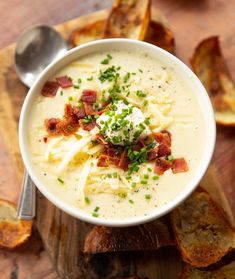 loaded baked potato soup in a white bowl