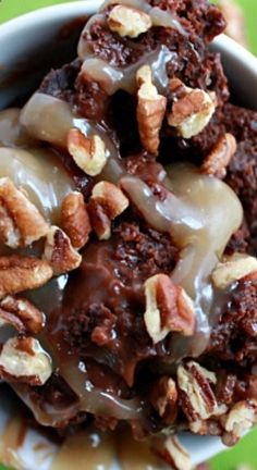 a close up of a bowl of food with nuts