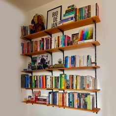 the bookshelves are filled with many different types of books