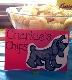 a bowl of chips with a sign that says charkie's chips on it